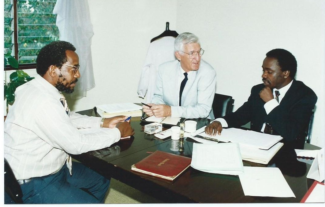From Left: Dr. Frank Mosha, Director, Tropical Pesticide Research Institute (TPRI), Tanzania; Dr. Paul Capstick, Deputy Executive Director, African Biodiversity Institute (ABI)-GIDE; and Dr. Alfred Latigo, Executive Director, ABI-GIDE: Discussing a joint TPRI-ABI Impact Evaluation Project Funded by IDRC at GIDE Offices in Nairobi, Kenya (1995)