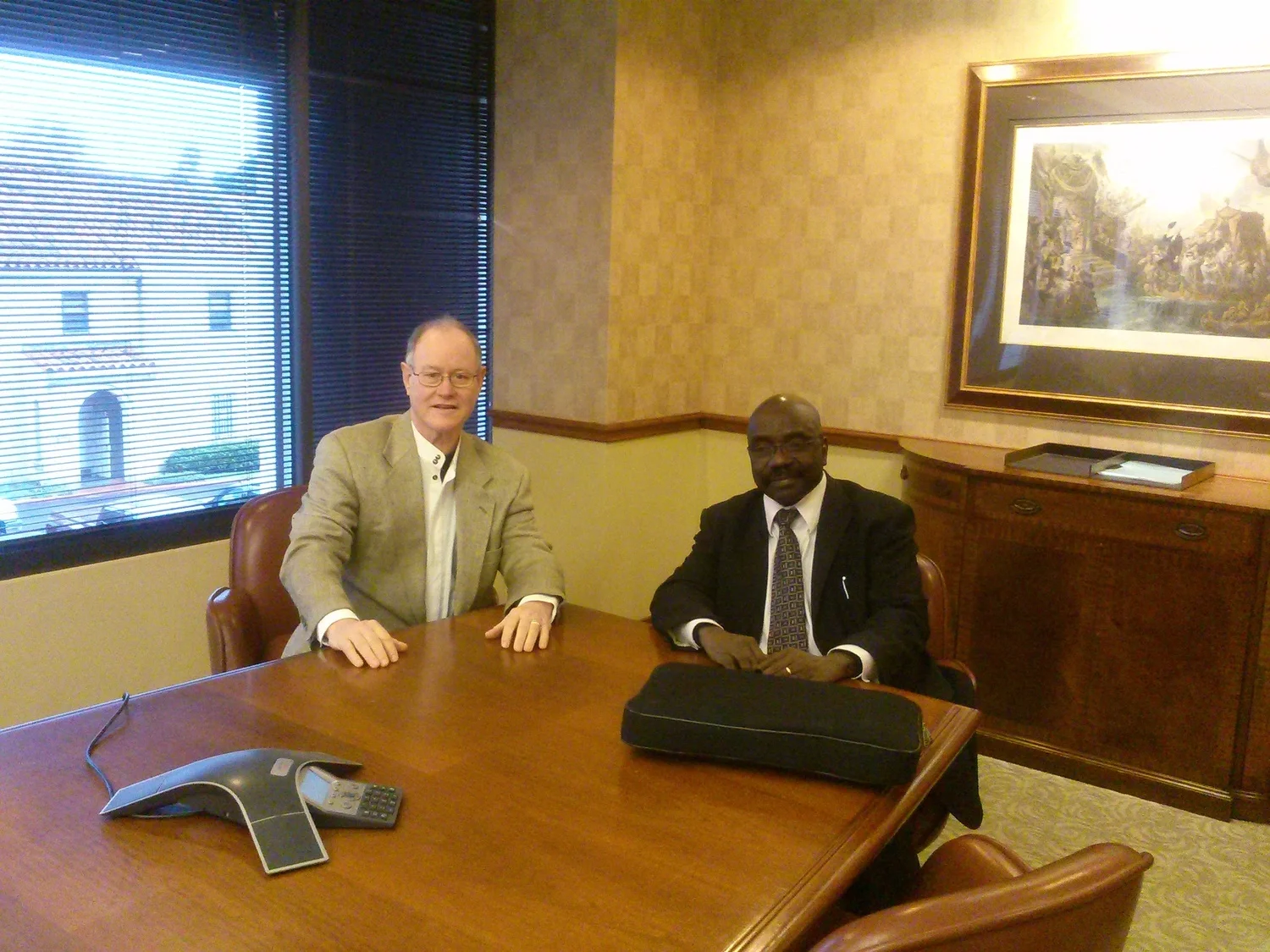Kurt Wall, Board Director with Alfred Latigo, President after a Board Meeting with other Directors via Video Conferencing