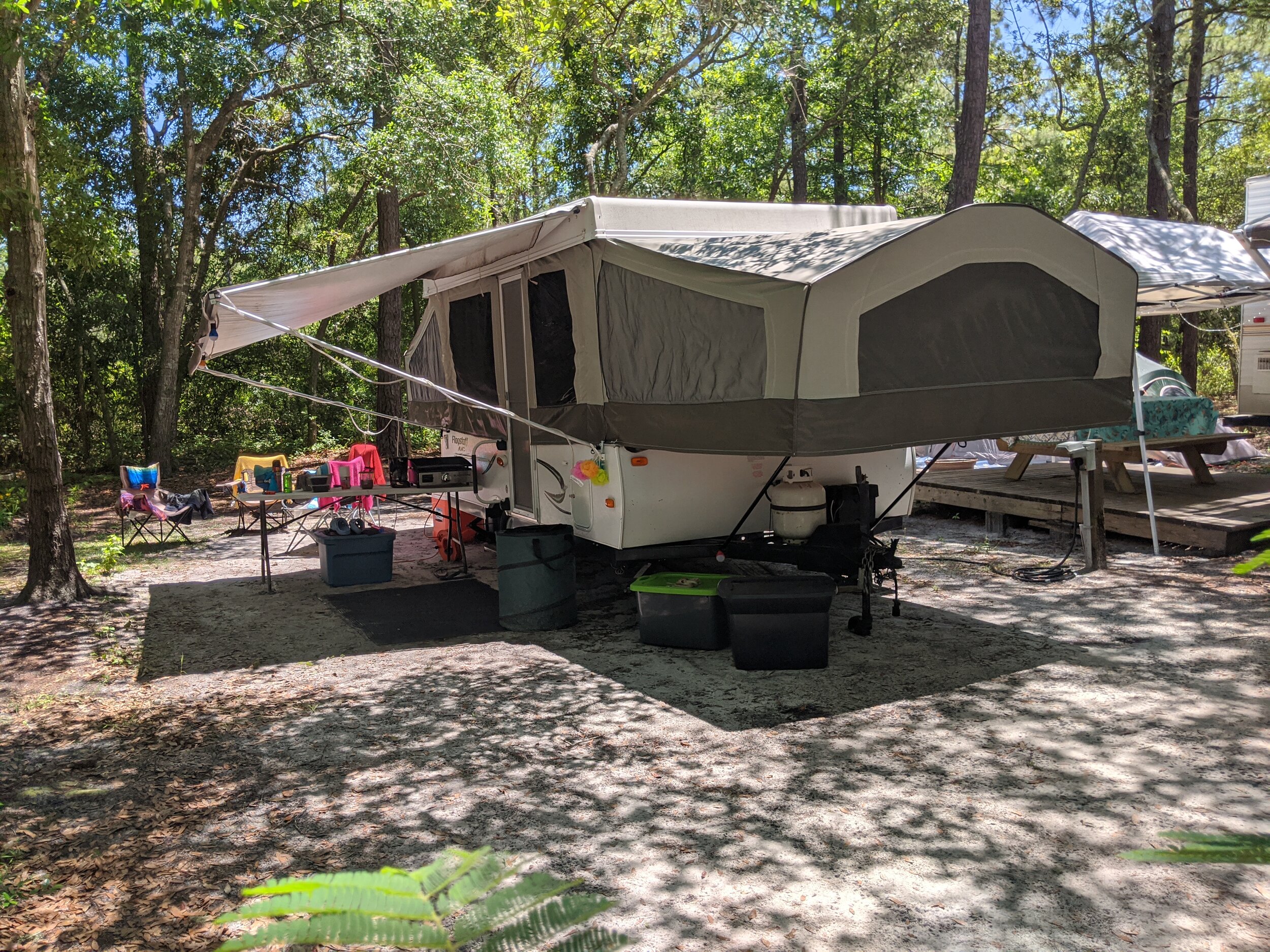 Mature taking a campsite shower