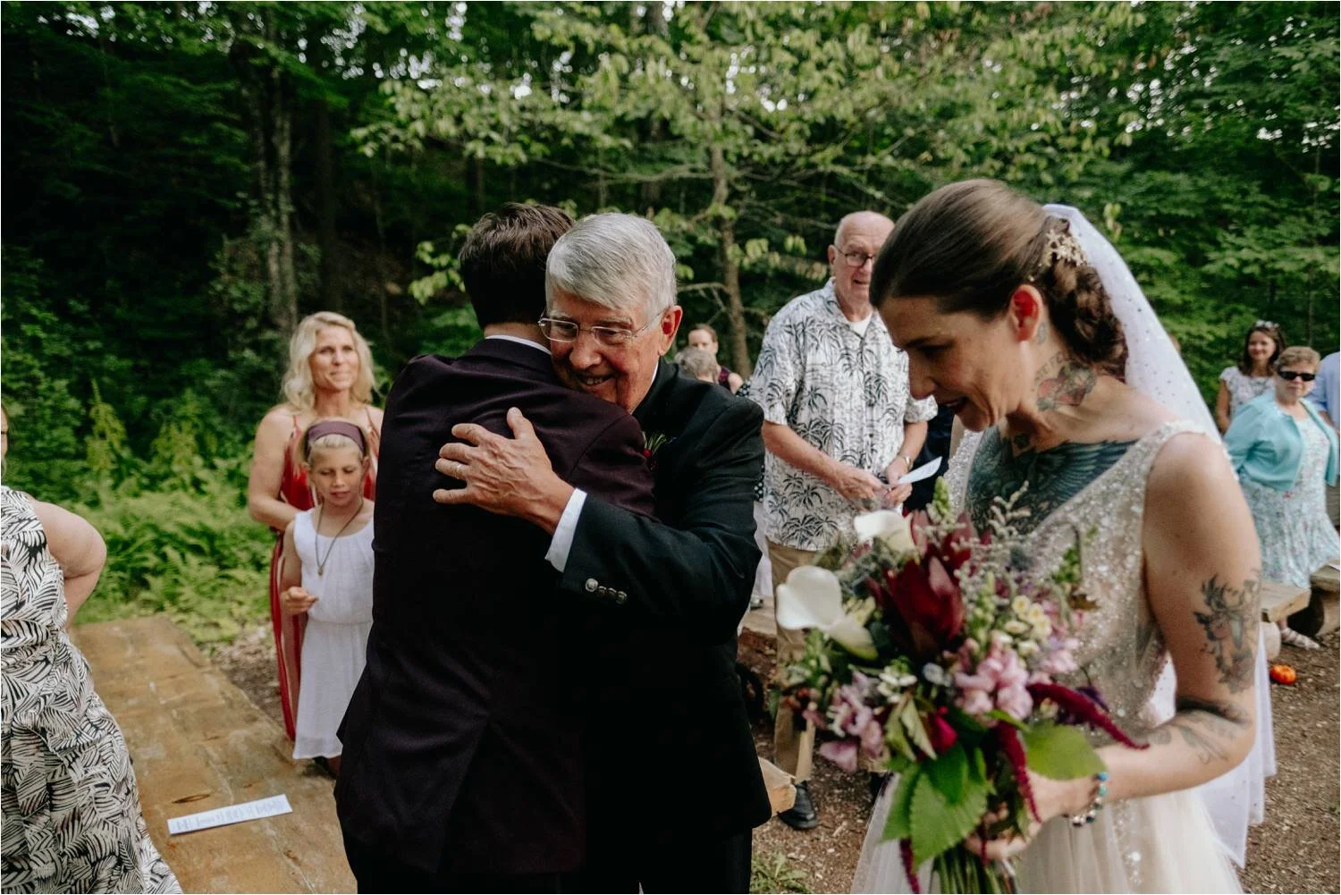 Wedding Ceremony at Whitney's In Jackson New Hampshire - Tattooed Bride wearing BHLDN Wedding Dress - Jemima Richards