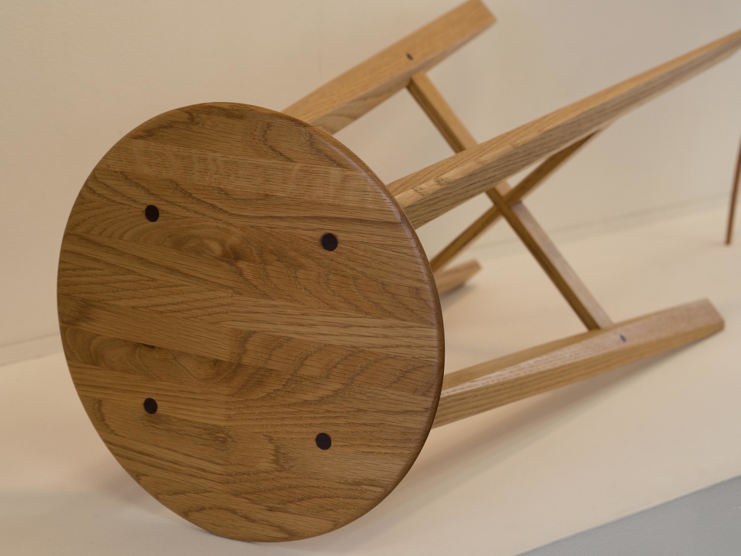 Eddy Stool in American White Oak with faceted legs.