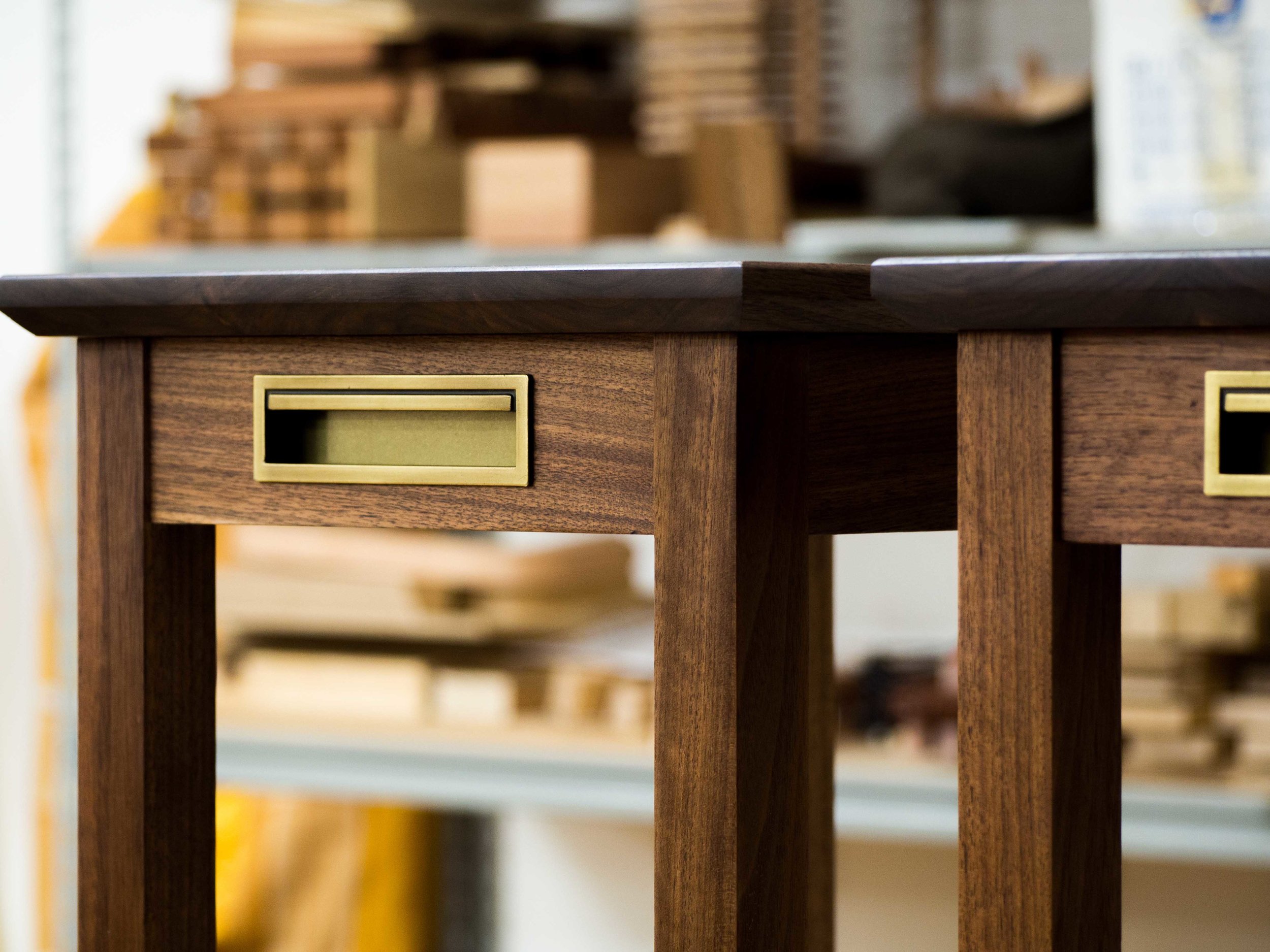 Nick's stools in Black Walnut with Brass details.