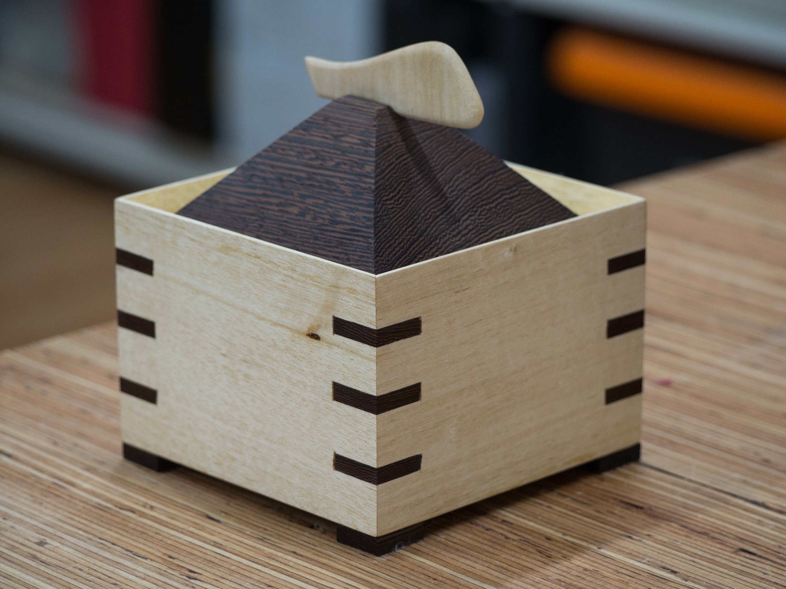 Isidoro's box project with keyed mitres. Zebrano and Rock Maple.