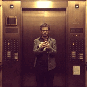 haggard man thinks he'll stay in this elevator awhile