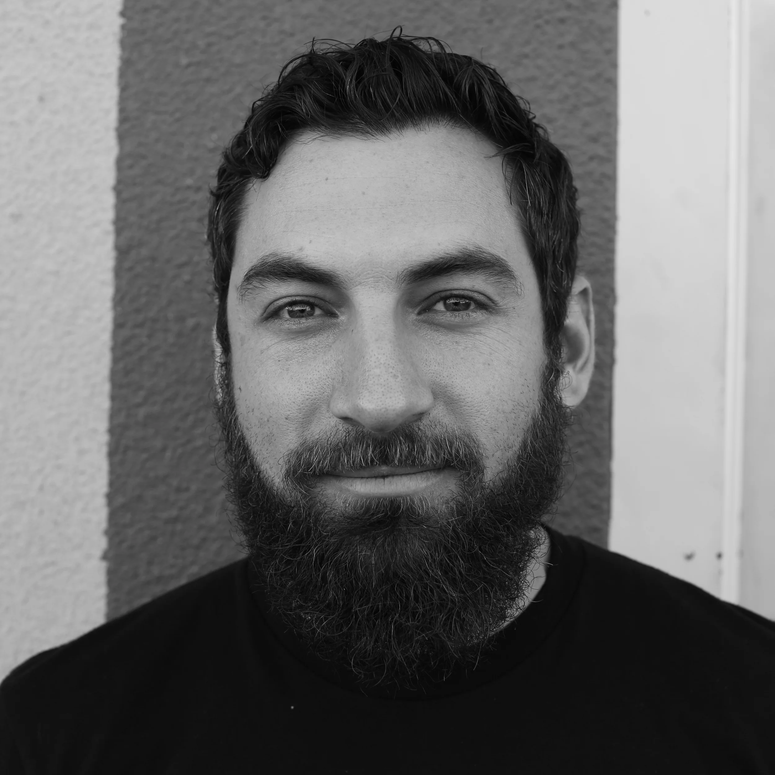 Coach - Travis Holley