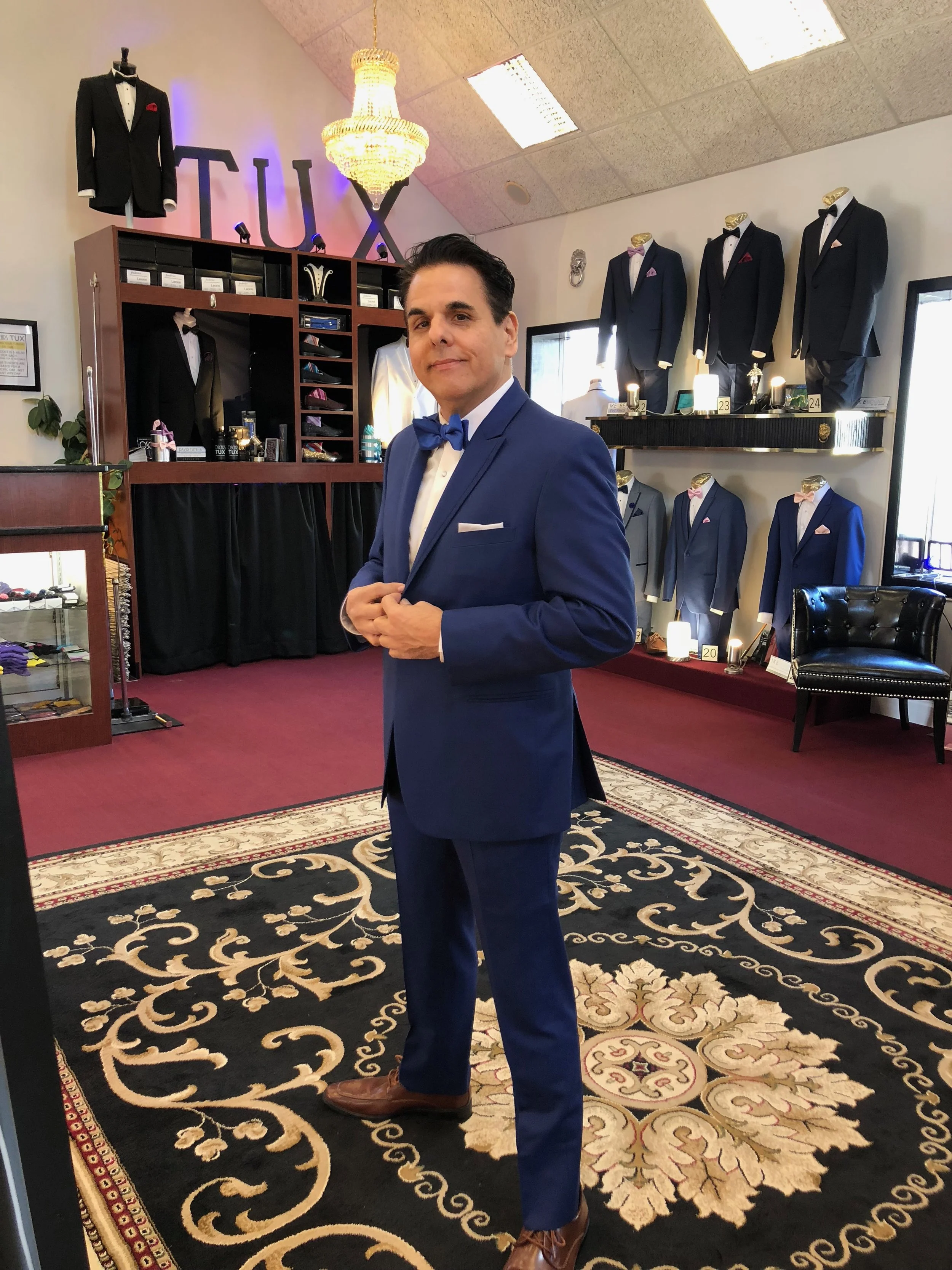Oscar Sosa is wearing # 21 Cobalt Blue Tuxedo 