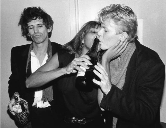 Always serve your company first. (L-R: Keith Richards, Tina Turner, David Bowie)