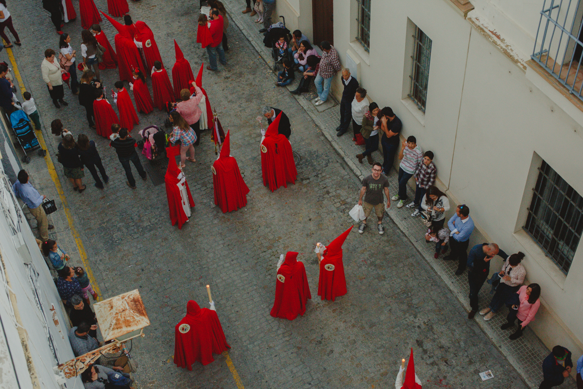 My husband coming back with dinner among the processions. / Mon mari revient avec les souper et doit passer pas des processions qui avaient lieu sur notre rue.