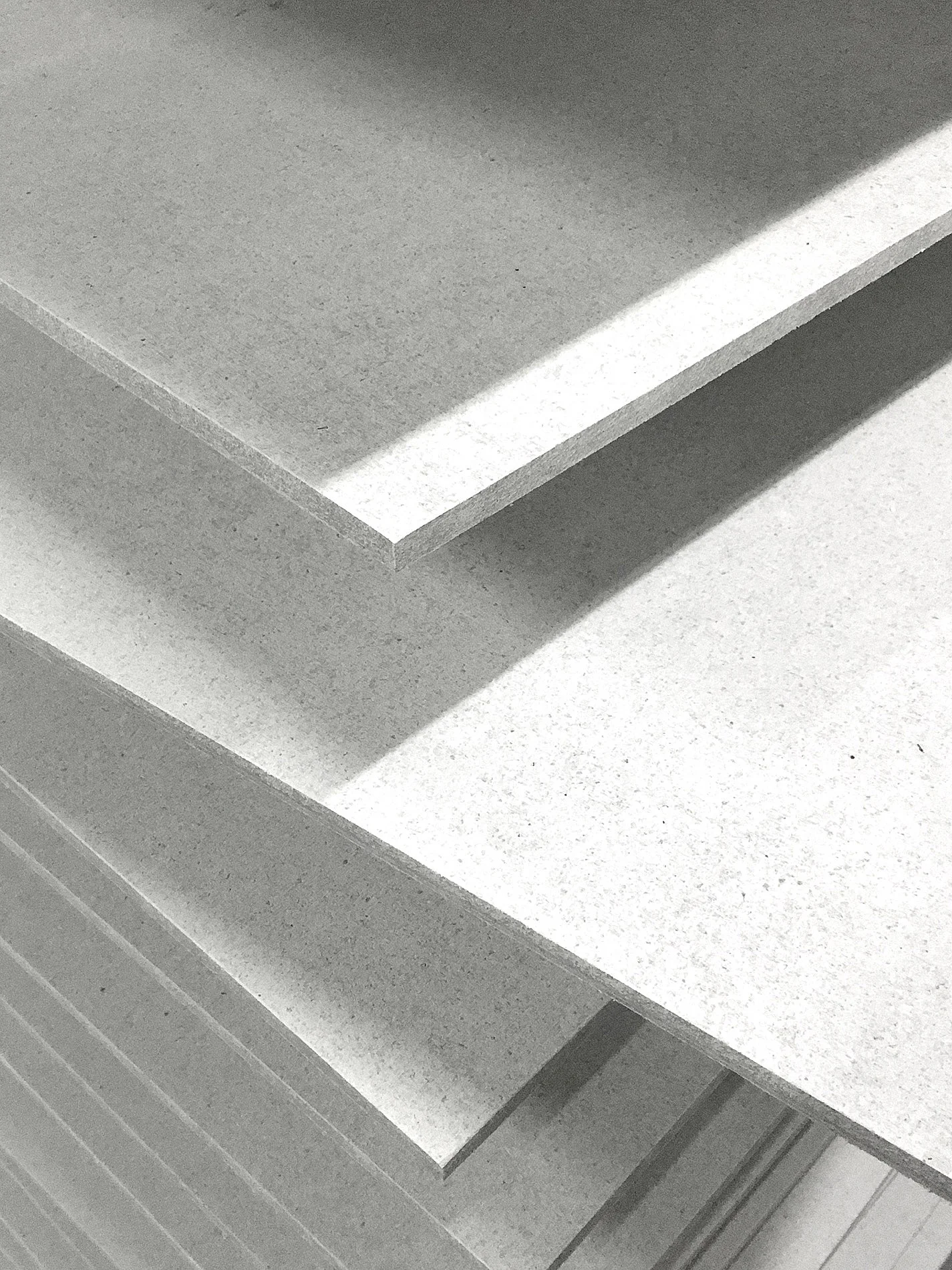 Light grey flooring made with raw construction material