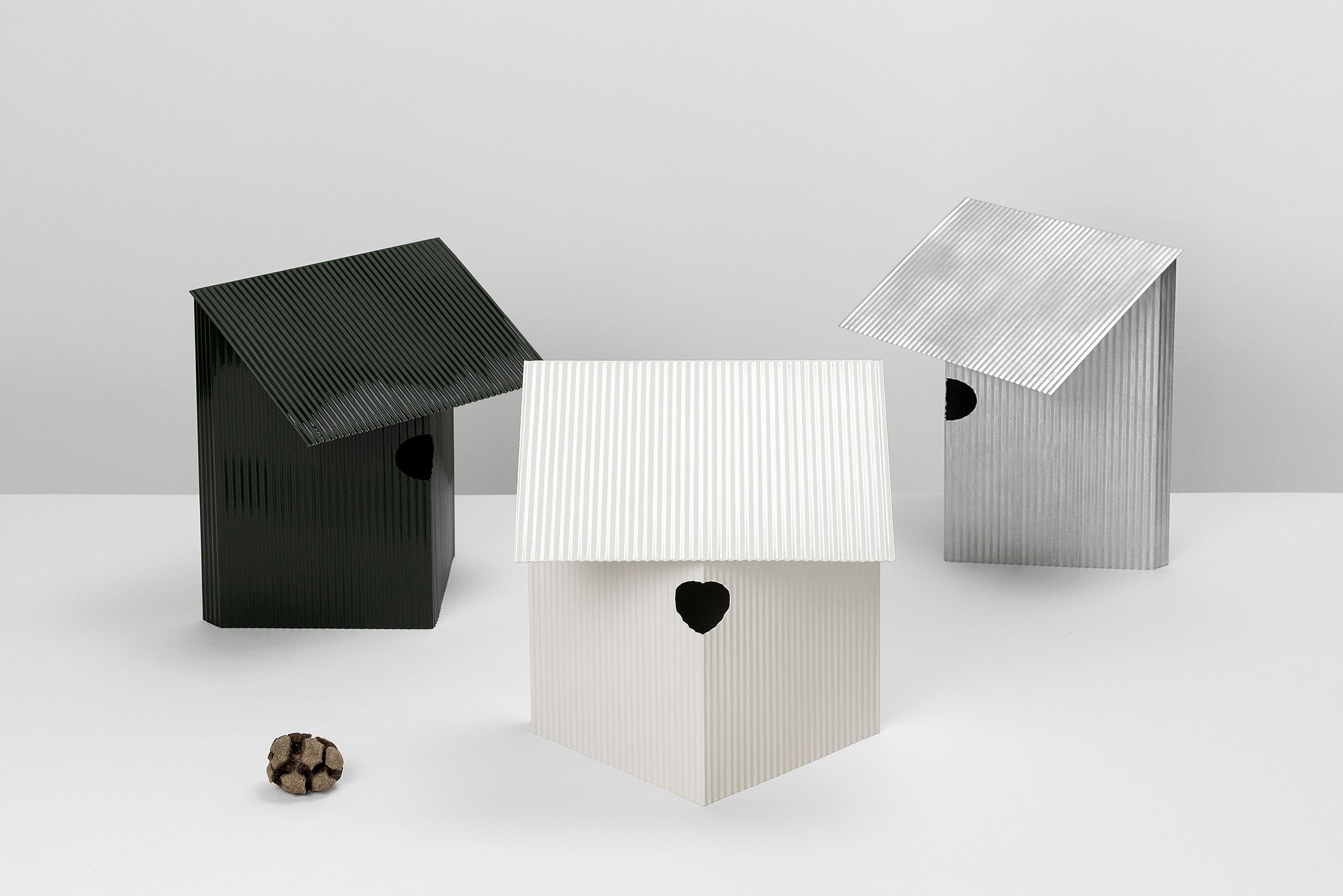  The “With Love” birdhouse refers to vernacular architecture commonly found in rural landscapes — small, anonymous structures that serve as simple storage for materials, machines, or food. 