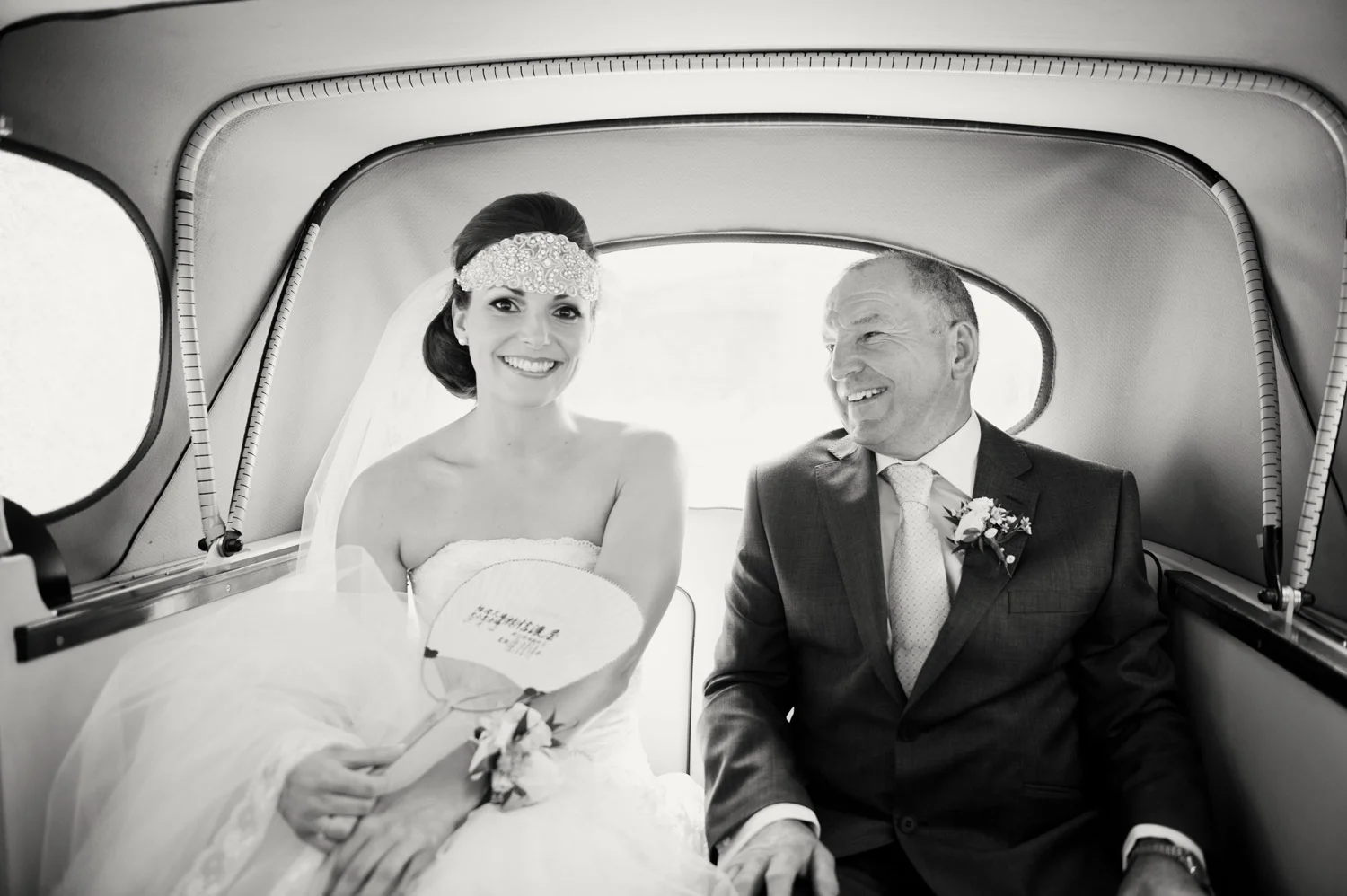 bride and father in car outside church fan tipperary Ireland Wedding Photography Irish wedding photographers