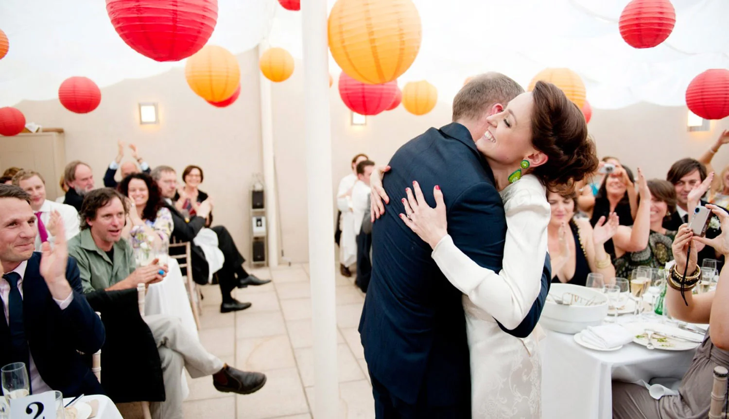 Bride and Groom Hug Red and Yellow balloons Sandymount Rosedale Ireland Wedding Photography