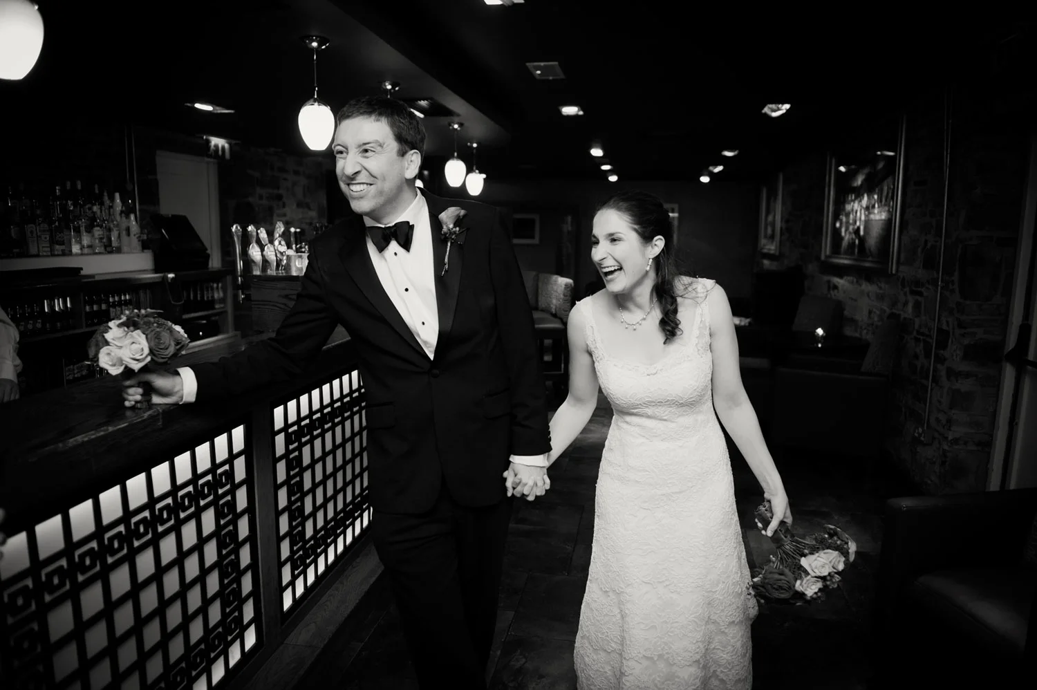 Bride and Groom with flowers enter reception Ballymagarvey in Balrath Meath Ireland Wedding Photography
