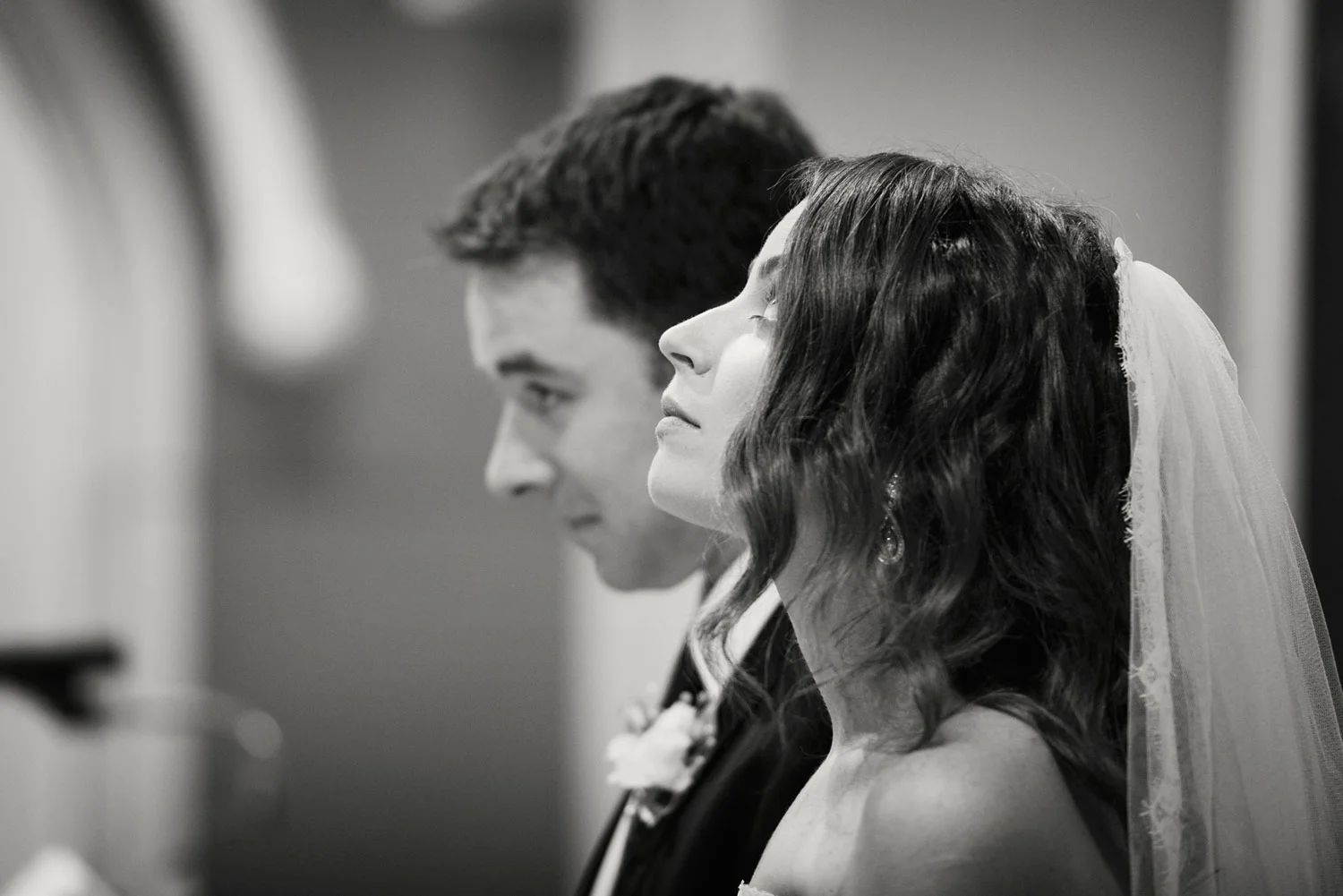 bride looking up in church dun laoghaire dublin Ireland Wedding Photography Irish wedding photographers