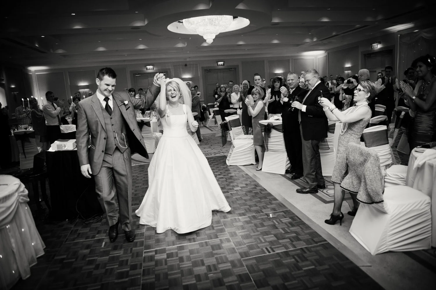 Bride and groom entrance to Dinning Hall Druids Glen Wicklow Irish Wedding Photographers
