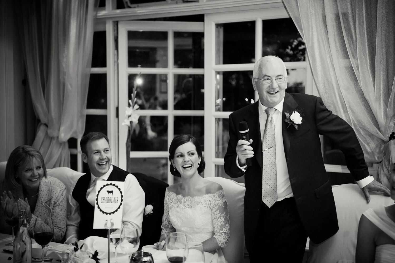 Bride and groom laughing at speeches Mount Juliet Kilkenny Ireland Wedding Photography