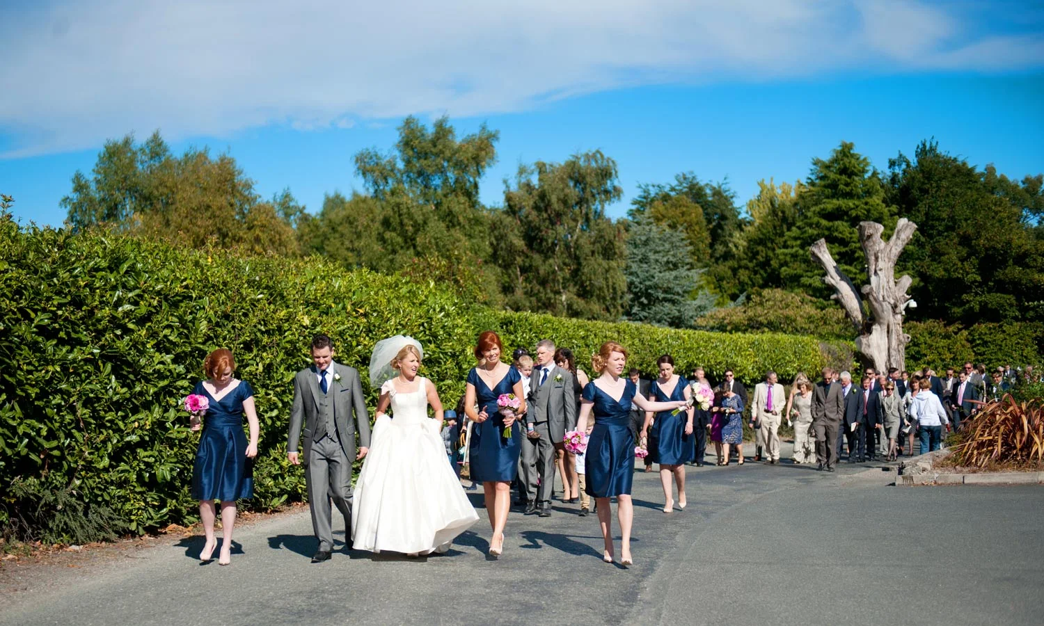 Bridal Party walking Druids Glen Wicklow Irish Wedding Photographers