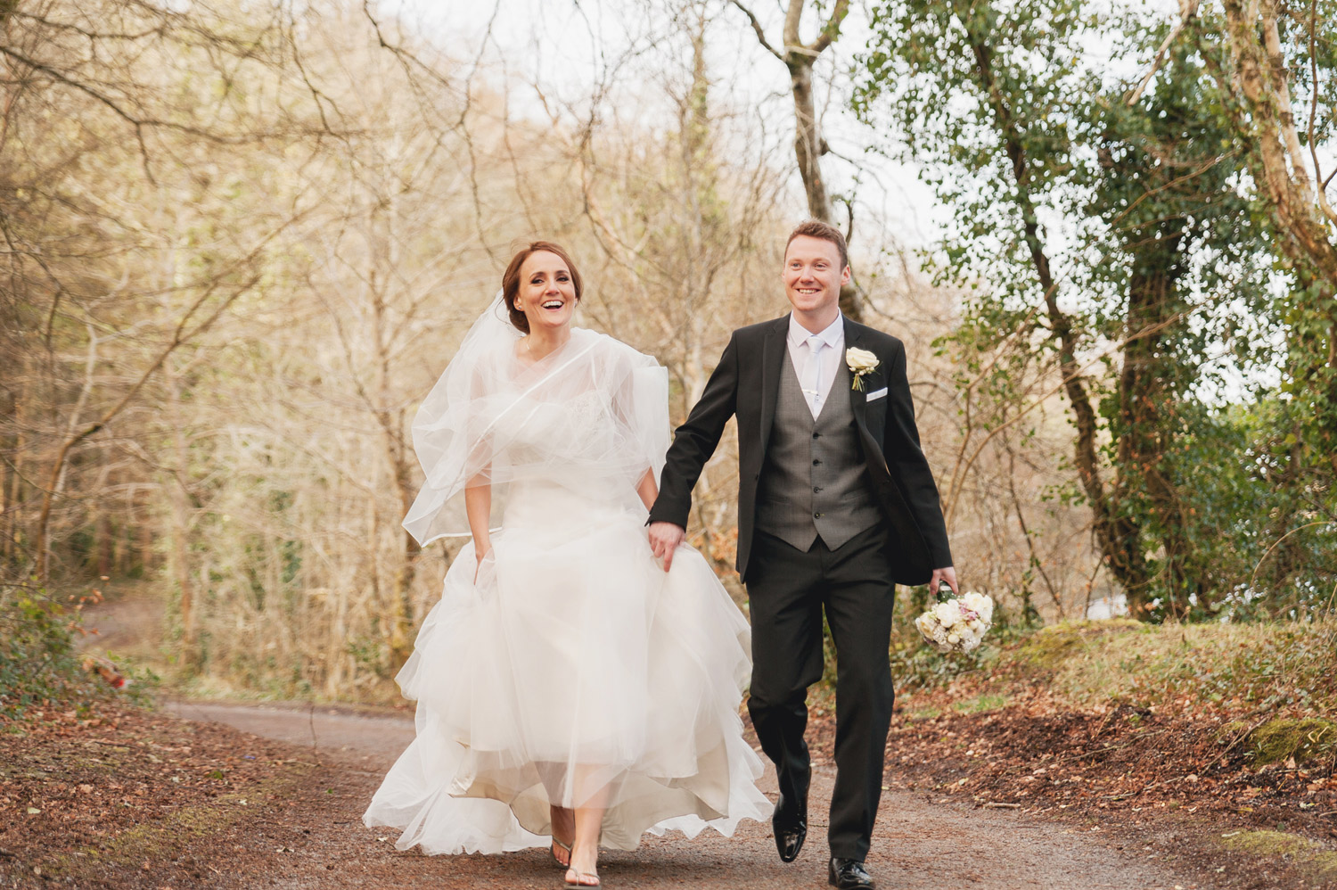 Bride and Groom Walking and laughing in Castle Dargan Sligo Wedding Photographers