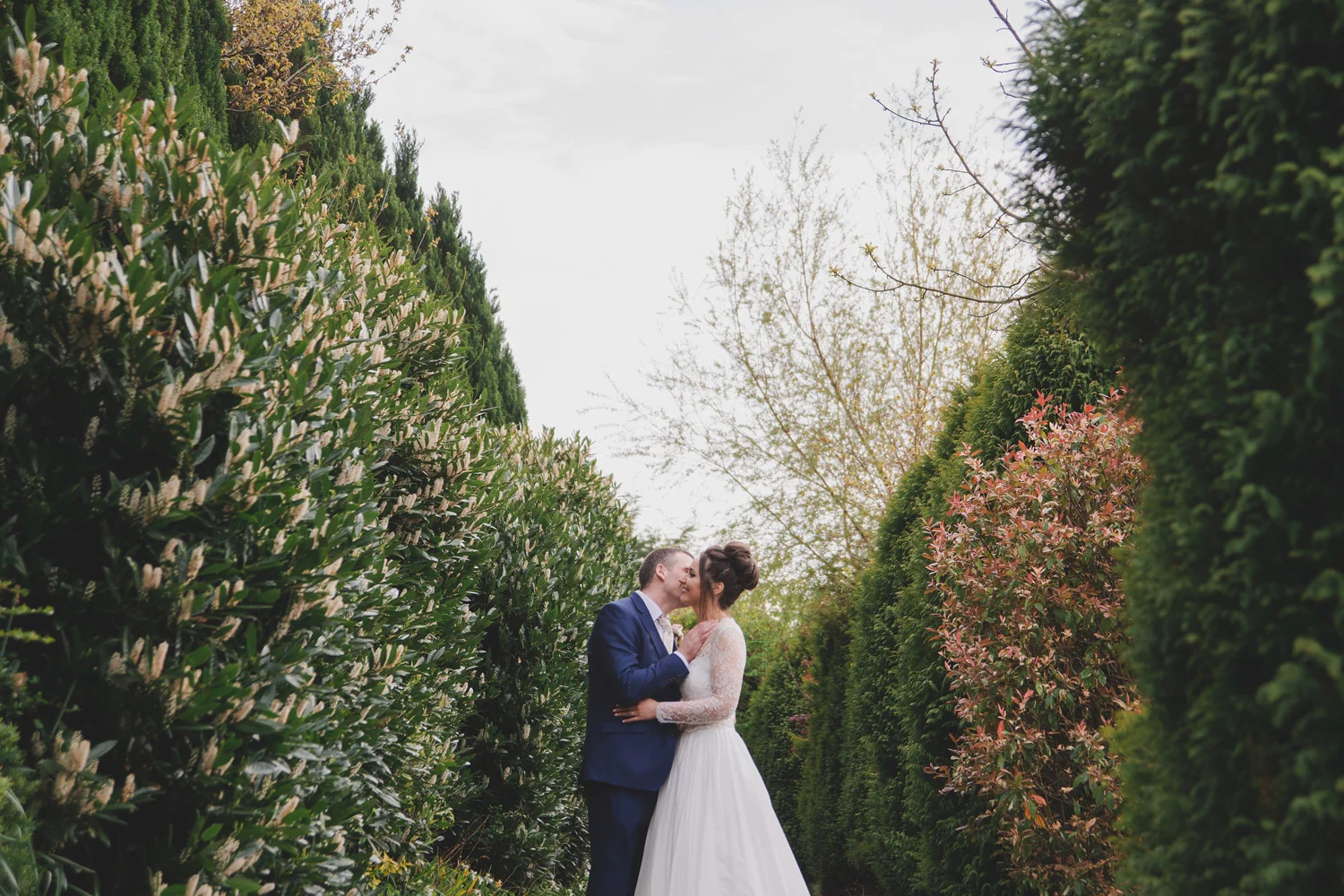 Bride and groom in Brandon House Hotel Garden. New Ross Wexford Wedding photographer.