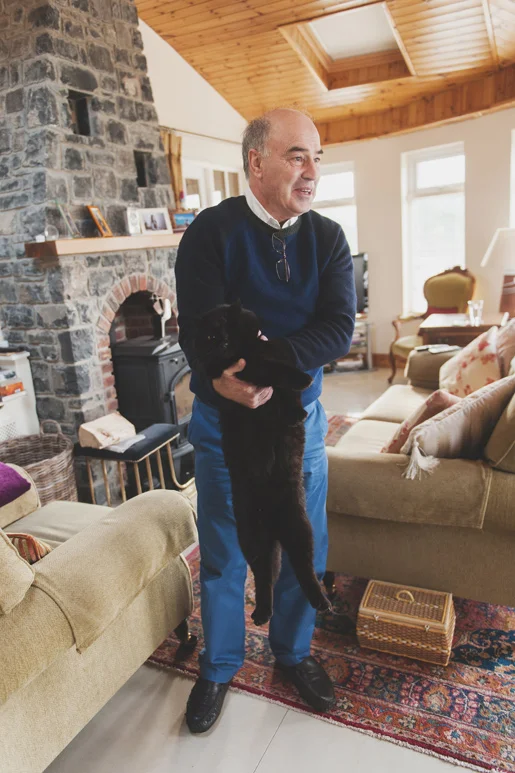 Father of the bride and their one-eyed cat