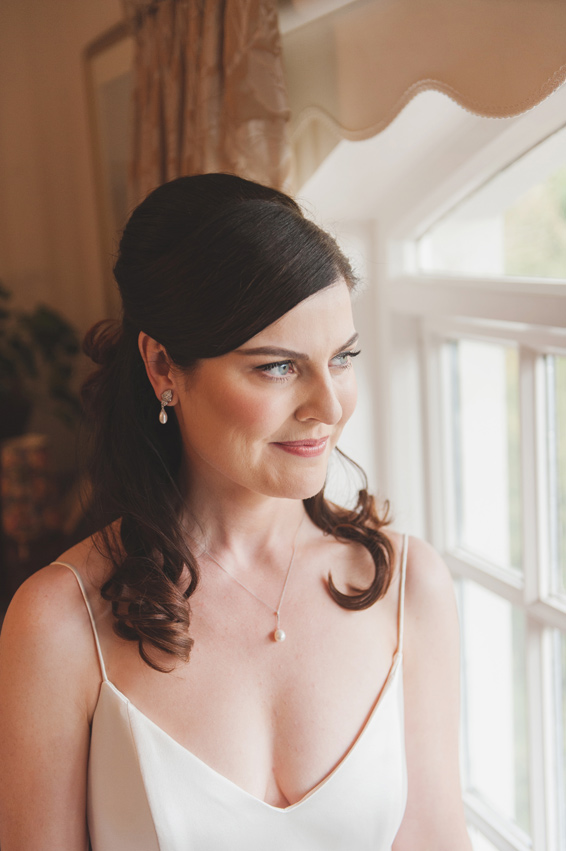 Bridal portrait by window