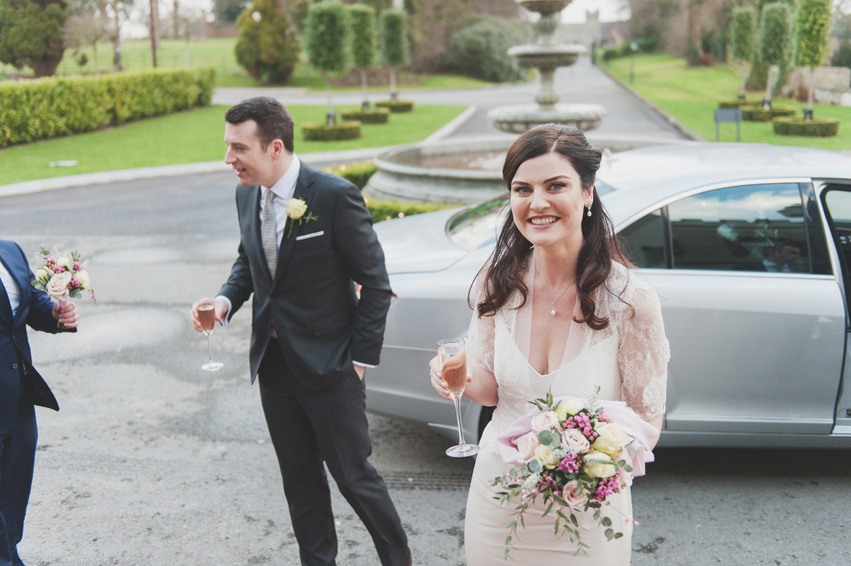 Bride and groom arriving at Bellingham Castle Hotel