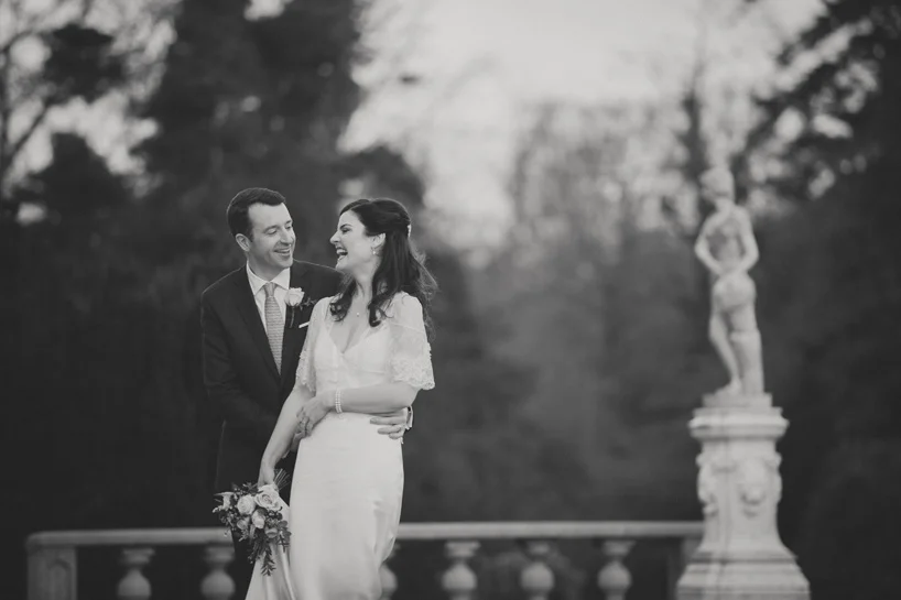 Bride and groom laughing together in Bellingham Castle Hotel Louth