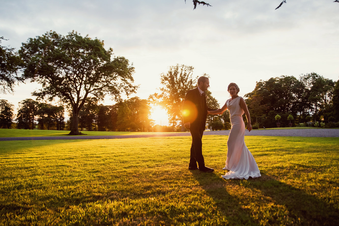 Bride and groom at sunset in Tankardstown House Meath Wedding photographers meath ireland