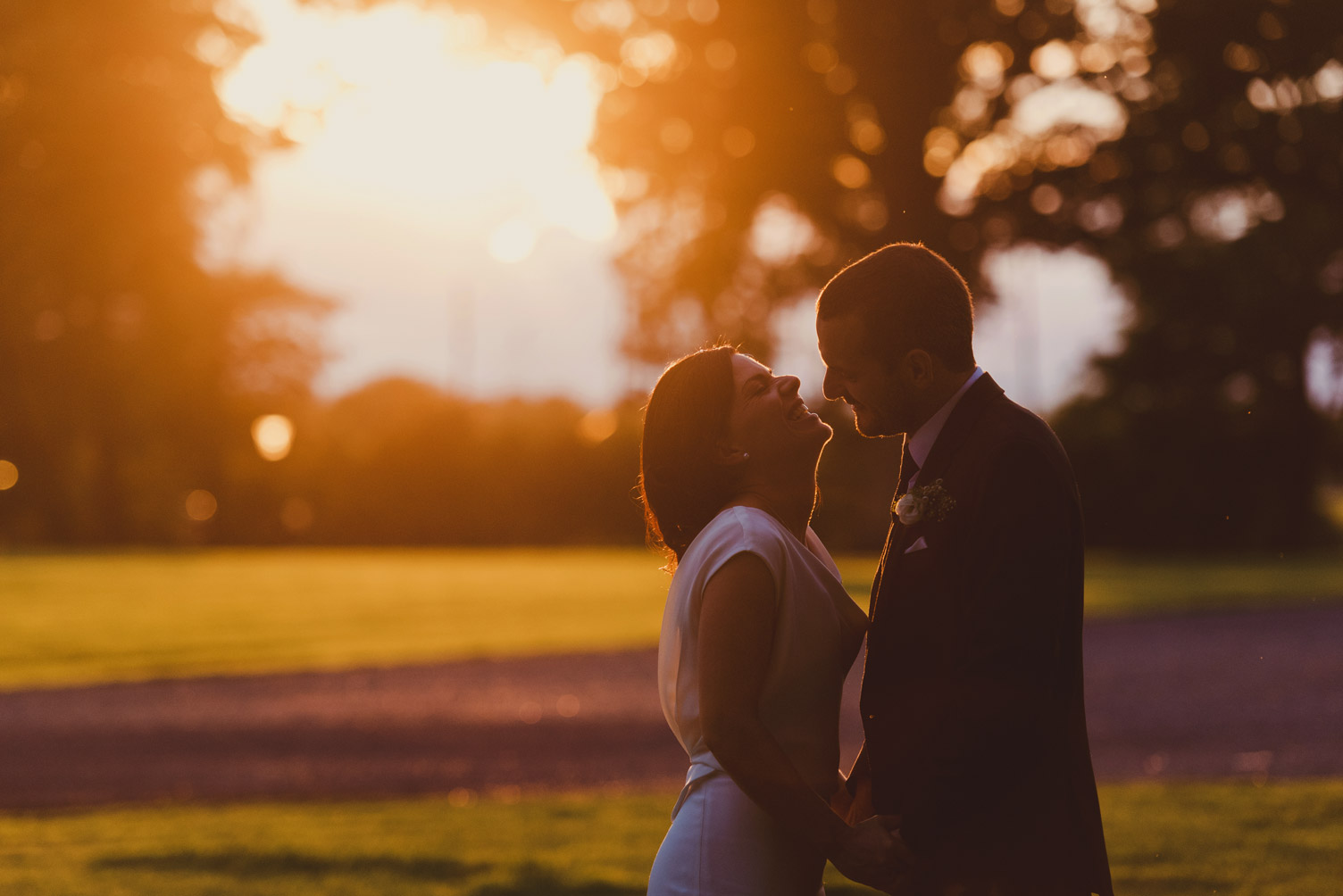 Bride and groom laughing in Tankardstown House Meath Wedding photographers meath ireland