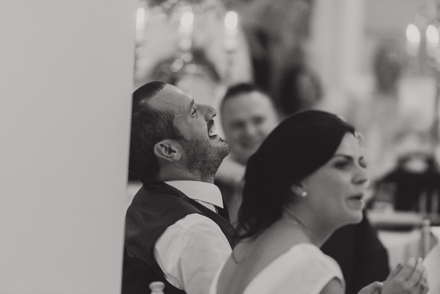Groom laughing in Tankardstown House Meath Wedding photographers meath ireland