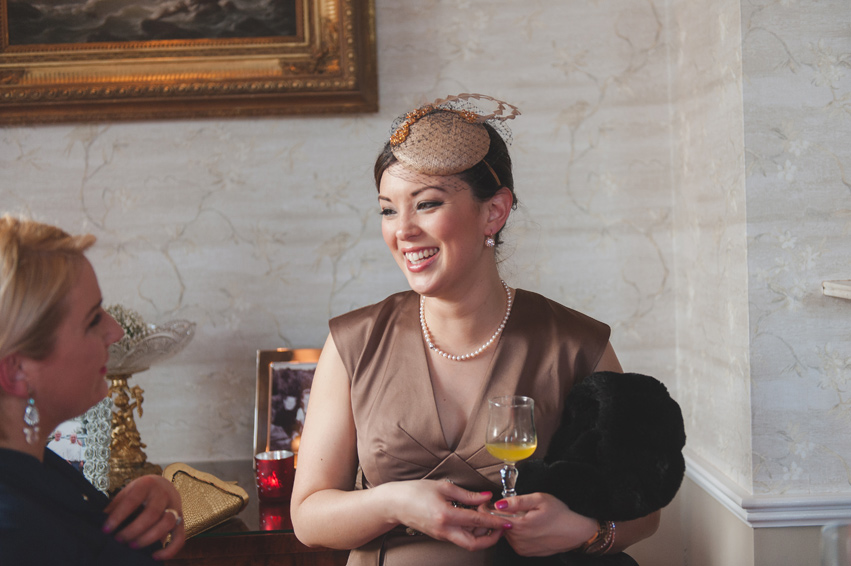 Guests enjoying wedding reception at Bellingham Castle Hotel, Louth. Wedding photographers Louth. 