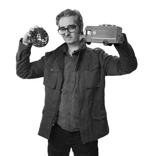 Bre with globe and truck.jpg