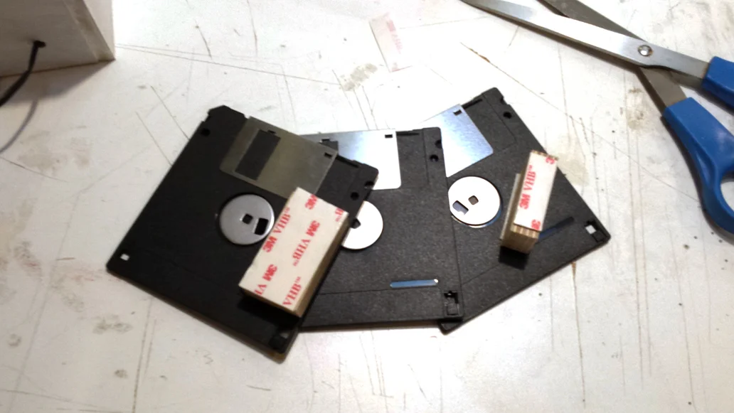 Attaching the Simcity 2000 3.5in Floppy Disks together with 3M VHB double sided tape
