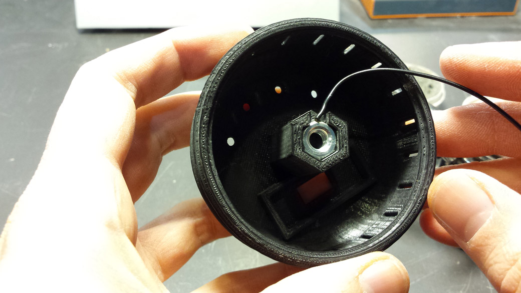 The Common Ground Lead soldered to the Top Nut