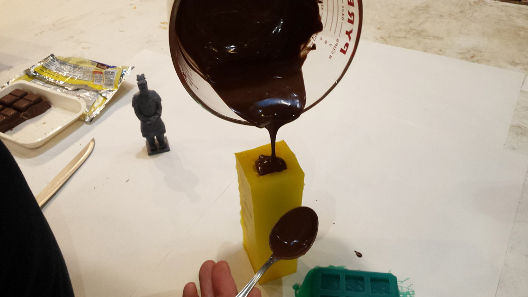 Pouring molten Chocolate into the Dragon skin Terracotta Warrior Mold