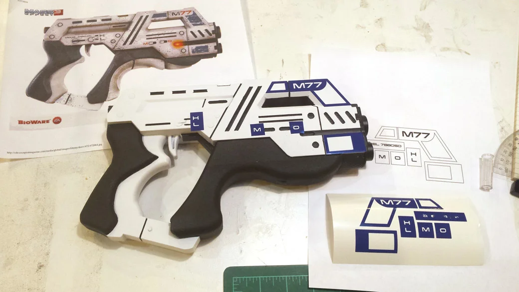 3D Printed Cosplay Mass Effect Pistol with detailed vinyl mask applied