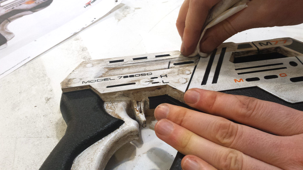 Wiping away the excess weathering on the 3D Printed Cosplay Mass Effect Pistol