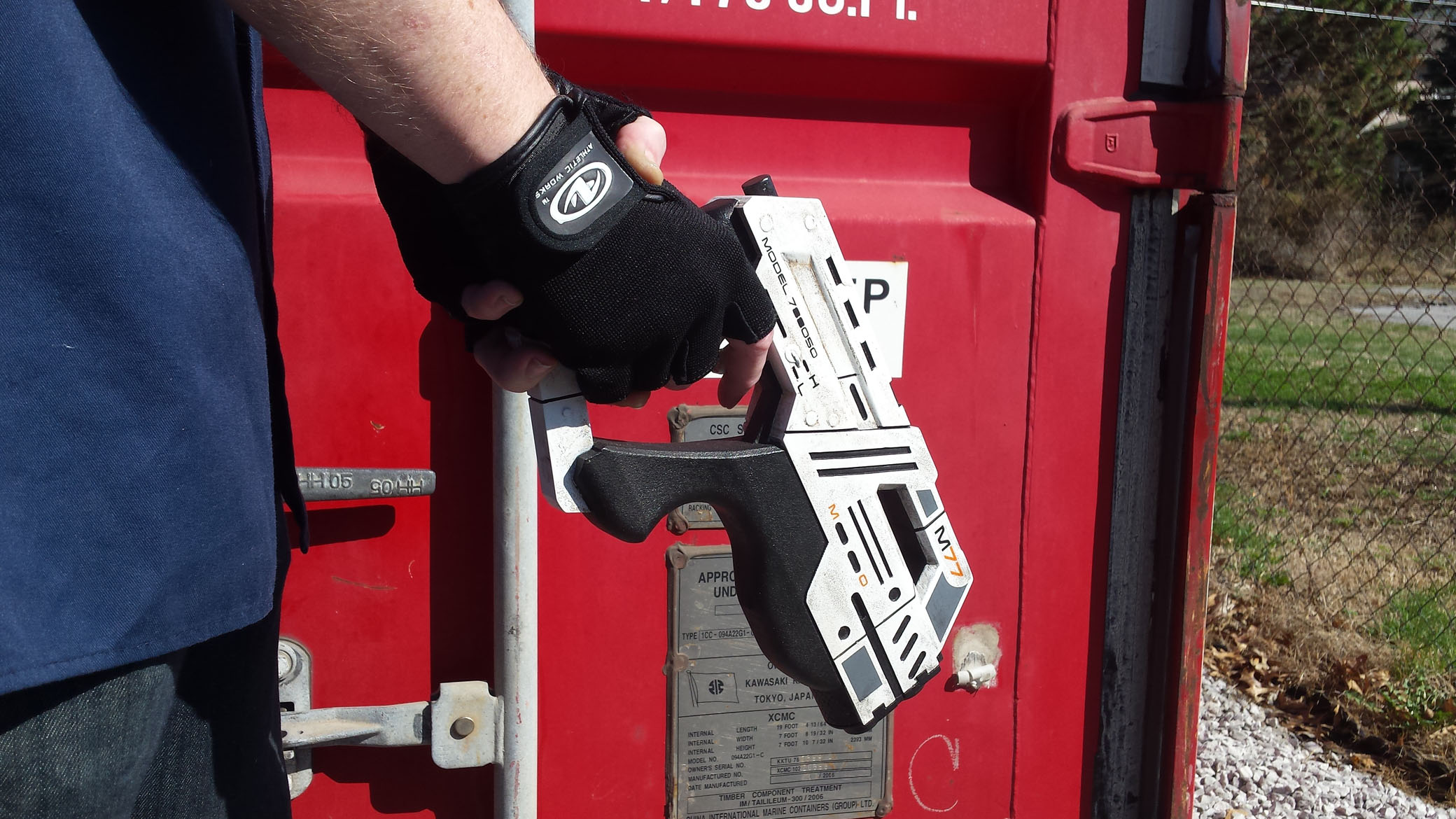 3D Printed Cosplay Mass Effect Pistol in the hands of a space marine, ready to rock