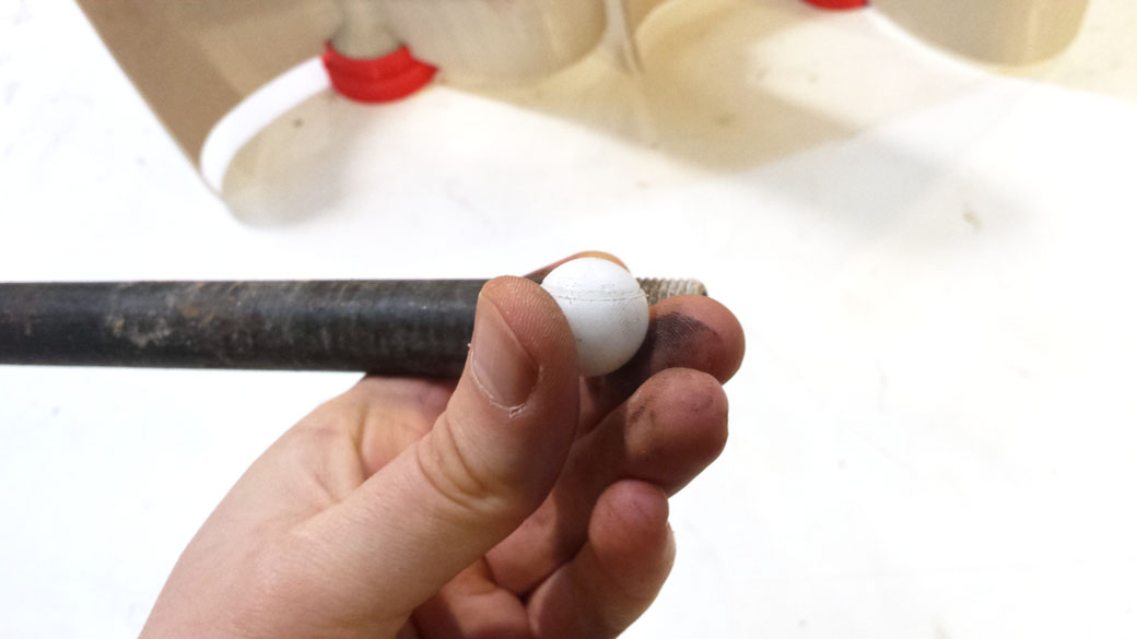 After two years spinning in the wind the Delrin Bearing at the top of the 3D Printed Axial Wind Turbine had a deep groove cut in it but the metal gaspipe. 