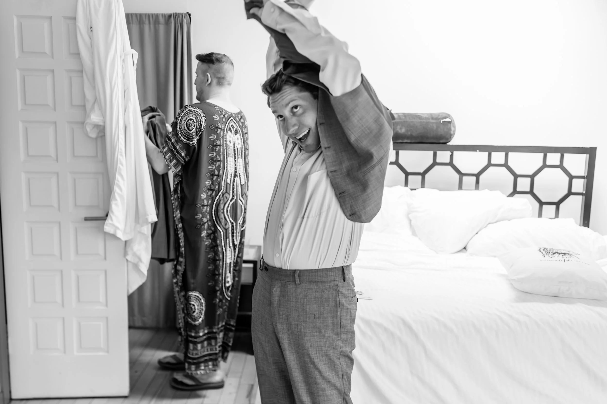Stefy Hilmer Photography- groom is getting dress at Buttermilk Falls.jpg
