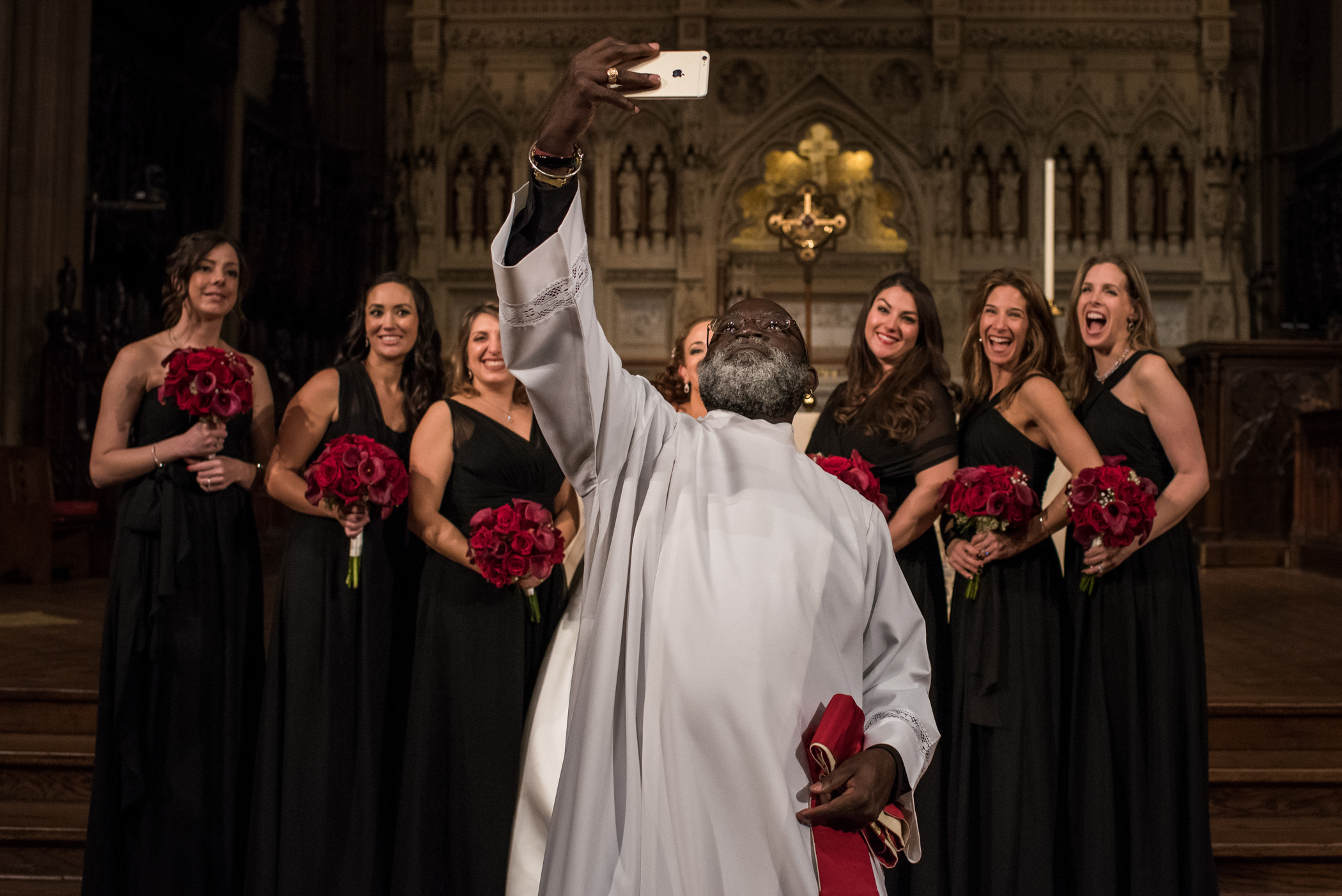 Stefy Hilmer Photography-priest jumping in front of the bridal party taking a selfie.jpg