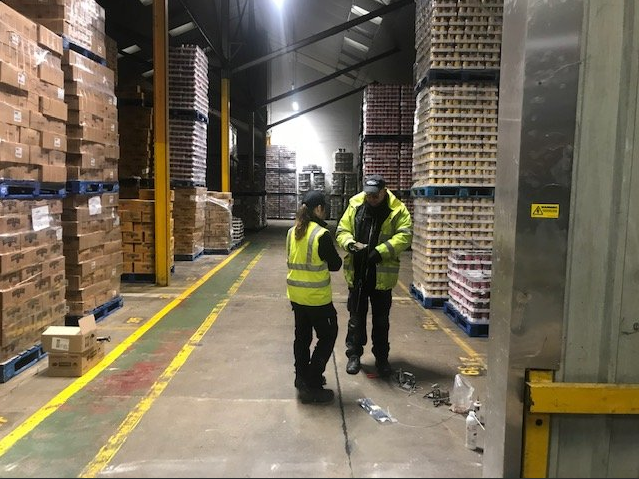 The Abate Pest Management Team setting up the RatMat in the distribution warehouse