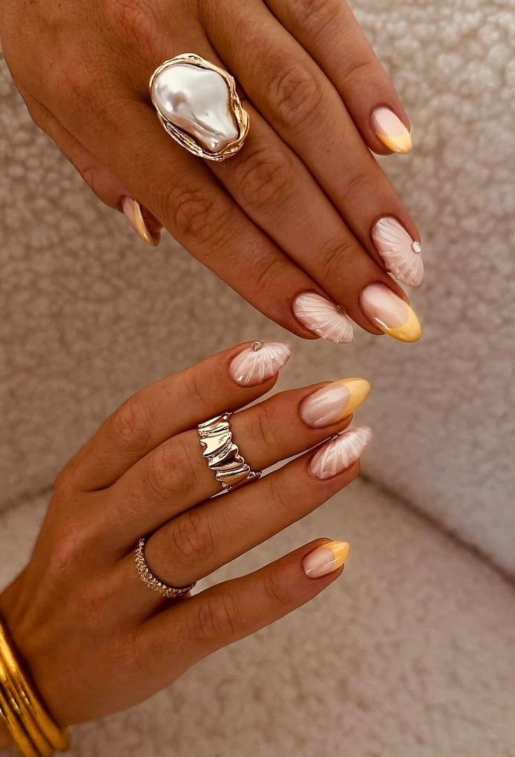 Yellow and white shell inspired nails