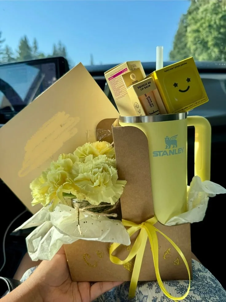 Yellow stanley cup gift basket