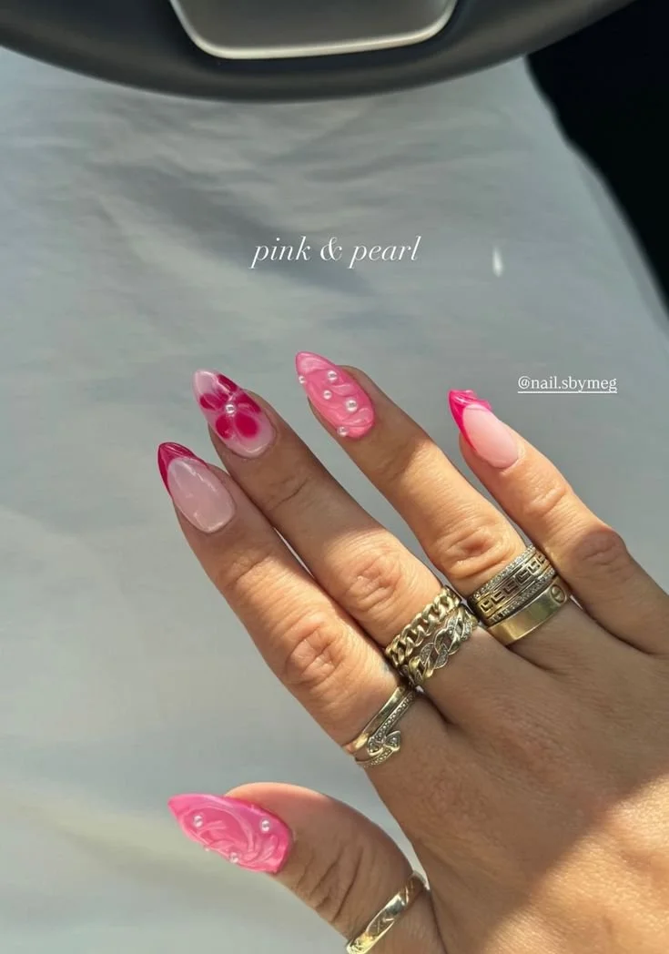 pink hibiscus flowers and pearls nails.jpeg