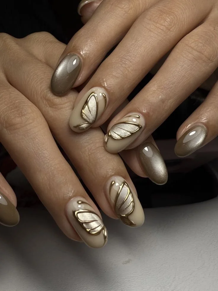 beige butterfly cat eye nails