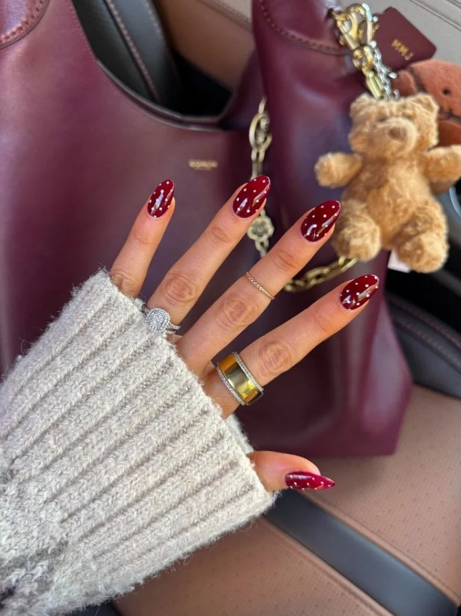 berry red polka dot nails