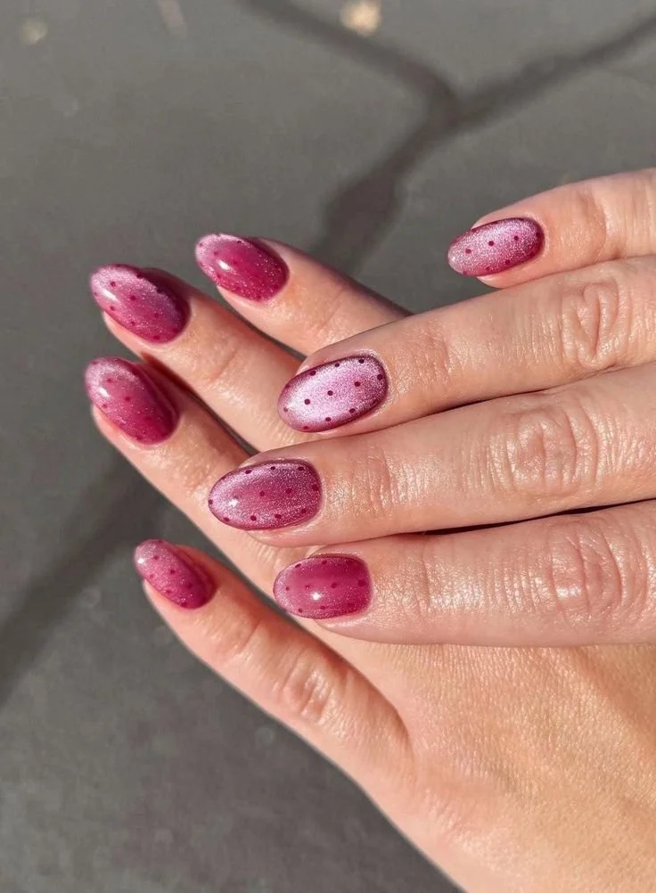 raspberry polka dot cat eye nails