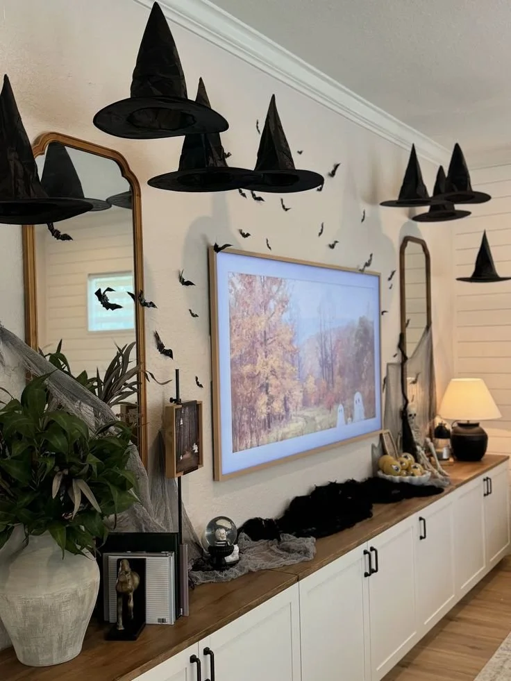 witch hats hung in living room