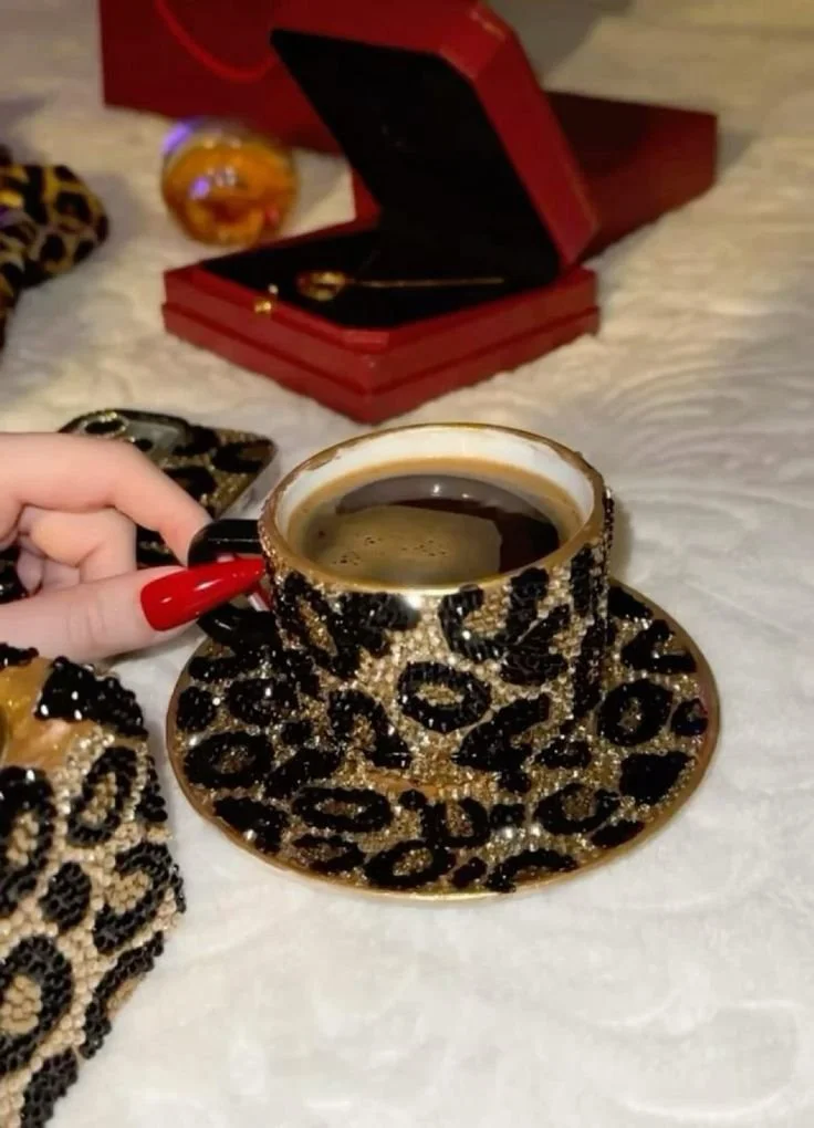 bedazzled leopard print espresso cup and saucer.jpeg